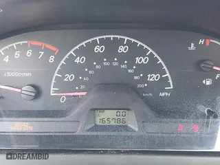 2004 Mitsubishi Lancer ES with VIN JA3AJ26E54U052124, listed as a IAAI auction lot 41804473 with 165,786 mi miles. Bid and sale history available at carsss.com. Image 7.