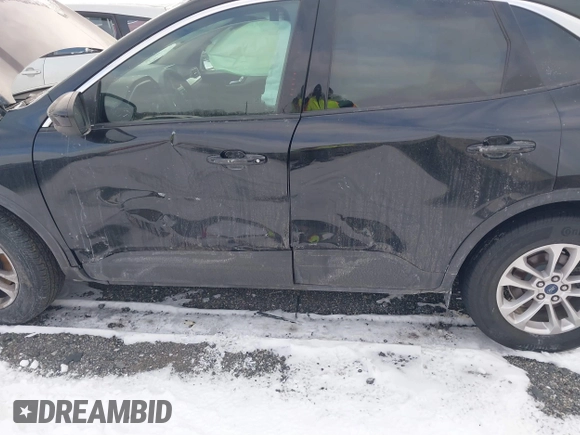 2020 Ford Escape SE z VIN 1FMCU9G64LUA05145, wystawiony jako IAAI lot #41250260 z przebiegiem 60 554 mil mil oraz . Historia ofert i sprzedaży dostępna na DreamBid. Obrazek 6.