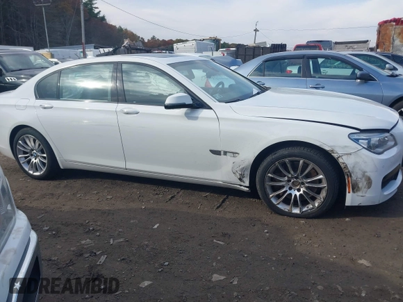 2015 BMW 7 Series 750Li xDrive with VIN WBAYF8C56FD654765, listed as a IAAI auction lot 40734550 with 133,848 mi miles and . Bid and sale history available at carsss.com. Image 13.