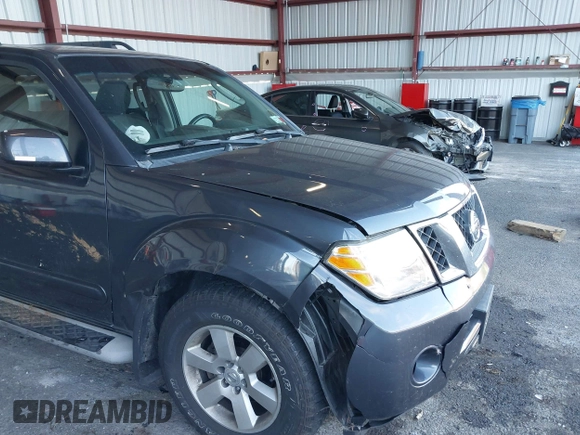 2011 Nissan Pathfinder LE z VIN 5N1AR1NB1BC616913, wystawiony jako IAAI lot #40627326 z przebiegiem 119 372 mil mil oraz . Historia ofert i sprzedaży dostępna na DreamBid. Obrazek 6.