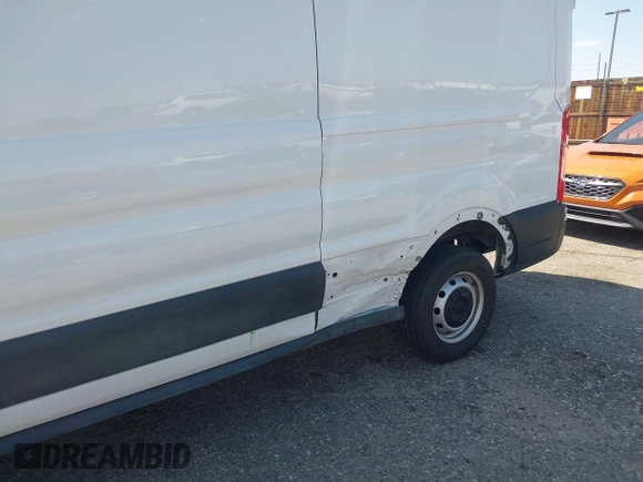 2023 Ford Transit Cargo with VIN 1FTBR1X80PKB45974, listed as a IAAI auction lot 42609404 with 35,940 mi miles and . Bid and sale history available at DreamBid. Image 6.
