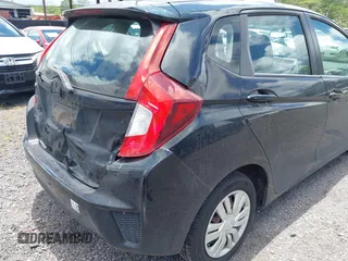 2017 Honda Fit LX z VIN 3HGGK5H58HM706357, wystawiony jako IAAI lot #42371826 z przebiegiem 91 099 mil mil oraz . Historia ofert i sprzedaży dostępna na DreamBid. Obrazek 17.