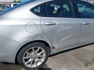 2013 Dodge Dart SXT with VIN 1C3CDFBA9DD159077, listed as a IAAI auction lot 42238744 with 106,300 mi miles and . Bid and sale history available at DreamBid. Image 6.