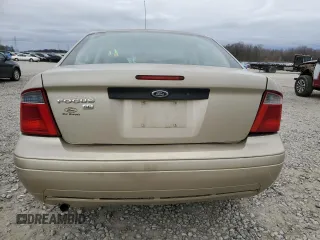 2007 Ford Focus S with VIN 1FAFP34N07W242359, listed as a Copart auction lot 61677025 with 164,445 mi miles and Salvage title. Bid and sale history available at DreamBid. Image 6.