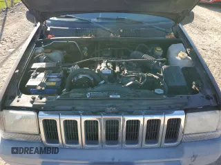 1998 Jeep Grand Cherokee Laredo with VIN 1J4FX58SXWC144715, listed as a Copart auction lot 86423594 with 93,936 mi miles and Clean Title. Bid and sale history available at carsss.com. Image 11.