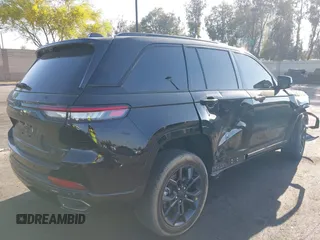 2024 Jeep Grand Cherokee with VIN 1C4RJYB6XR8612970, listed as a IAAI auction lot 42324488 with 5,701 mi miles and . Bid and sale history available at DreamBid. Image 4.