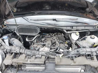 2022 Ford Transit Cargo z VIN 1FTBF4UG4NKA60882, wystawiony jako IAAI lot #42255992 z przebiegiem 2 977 mil mil oraz . Historia ofert i sprzedaży dostępna na DreamBid. Obrazek 10.