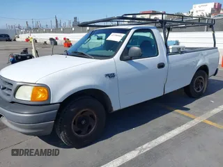 2004 Ford F-150 XL with VIN 2FTRF17W34CA91446, listed as a IAAI auction lot 42390946 with 271,177 mi miles and . Bid and sale history available at DreamBid. Image 2.