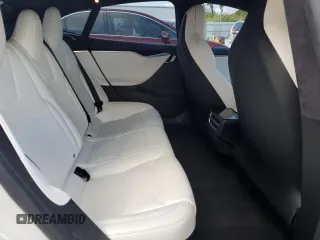 2017 Tesla Model S 100D z VIN 5YJSA1E21HF229936, wystawiony jako Copart lot #54734955 z przebiegiem 125 511 mil mil oraz Szkoda całkowita • Salvage title. Historia ofert i sprzedaży dostępna na DreamBid. Obrazek 11.