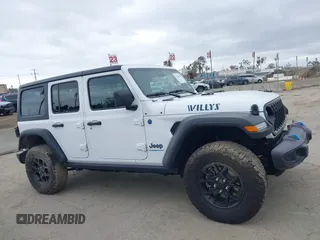 2024 Jeep Wrangler Willys z VIN 1C4RJXN66RW146102, wystawiony jako IAAI lot #41735965 z przebiegiem 12 092 mil mil oraz . Historia ofert i sprzedaży dostępna na DreamBid. Obrazek 13.