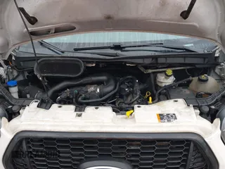 2021 Ford Transit Cargo with VIN 1FTBR2C82MKA29523, listed as a IAAI auction lot 41069336 with 195,397 mi miles and . Bid and sale history available at DreamBid. Image 10.