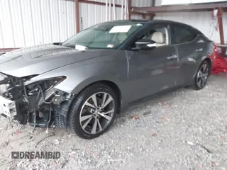 2016 Nissan Maxima SL with VIN 1N4AA6AP2GC379971, listed as a IAAI auction lot 41712080 with 192,382 mi miles and . Bid and sale history available at DreamBid. Image 2.