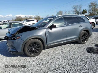 2021 Mazda CX-9 Grand Touring z VIN JM3TCADY1M0517525, wystawiony jako Copart lot #43868965 z przebiegiem 123 602 mil mil oraz Szkoda całkowita • Salvage title. Historia ofert i sprzedaży dostępna na DreamBid. Obrazek 1.