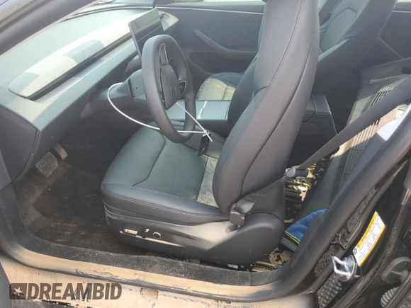 2025 Tesla Model 3 Long Range with VIN 5YJ3E1EBXSF939899, listed as a Copart auction lot 58074545 with Not provided miles and Salvage title. Bid and sale history available at DreamBid. Image 7.