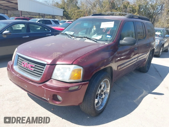 2003 GMC Envoy SLE with VIN 1GKES16S036238094, listed as a IAAI auction lot 41660209 with Not Provided miles and . Bid and sale history available at DreamBid. Image 2.