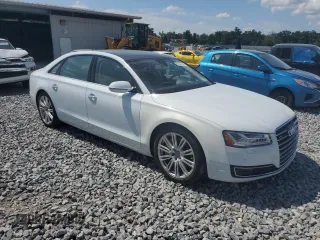 2015 Audi A8 3.0T z VIN WAU3GAFD9FN033886, wystawiony jako Copart lot #60137395 z przebiegiem 48 281 mil mil oraz Szkoda całkowita • Salvage title. Historia ofert i sprzedaży dostępna na DreamBid. Obrazek 4.