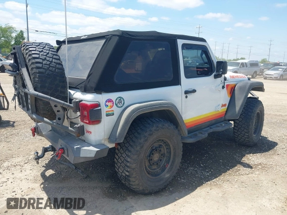 2018 Jeep Wrangler Sport with VIN 1C4GJXAN8JW302519, listed as a IAAI auction lot 42331871 with 51,639 mi miles and . Bid and sale history available at DreamBid. Image 4.