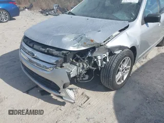 2012 Ford Fusion S with VIN 3FAHP0GA0CR315999, listed as a IAAI auction lot 40937858 with 164,719 mi miles. Bid and sale history available at carsss.com. Image 6.