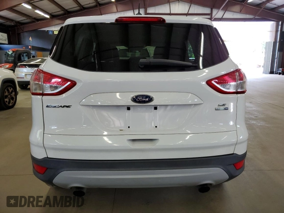 2013 Ford Escape SE z VIN 1FMCU9GX0DUD94201, wystawiony jako Copart lot #66153005 z przebiegiem 132 385 mil mil oraz Czysty tytuł • Clean title. Historia ofert i sprzedaży dostępna na DreamBid. Obrazek 6.