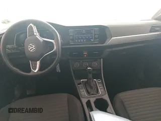 2024 Volkswagen Jetta S with VIN 3VW5M7BU5RM077151, listed as a IAAI auction lot 42796121 with 19,887 mi miles and . Bid and sale history available at DreamBid. Image 6.