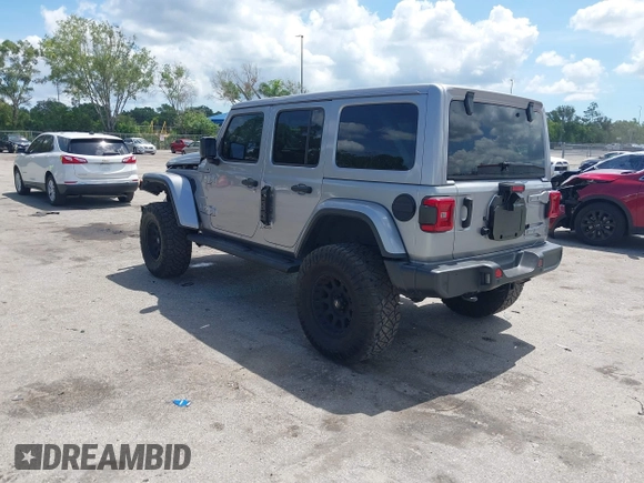 2021 Jeep Wrangler Unlimited Sahara with VIN 1C4HJXEN9MW637288, listed as a IAAI auction lot 42553459 with 39,362 mi miles and . Bid and sale history available at DreamBid. Image 3.