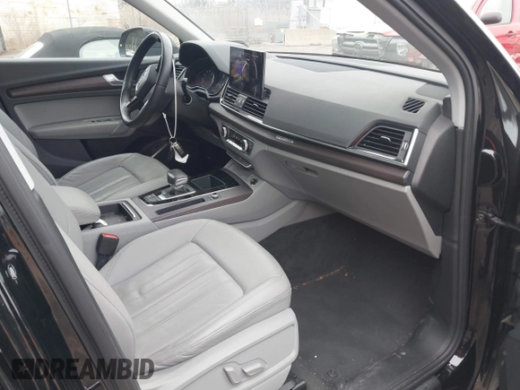 2022 Audi Q5 S line Premium z VIN WA1GAAFY0N2019698, wystawiony jako IAAI lot #41549059 z przebiegiem 24 105 mil mil oraz . Historia ofert i sprzedaży dostępna na DreamBid. Obrazek 5.