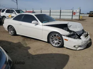 1998 Lexus SC 400 z VIN JT8CH32Y9W1001434, wystawiony jako Copart lot #44635385 z przebiegiem 125 440 mil mil oraz Szkoda całkowita • Salvage title. Historia ofert i sprzedaży dostępna na DreamBid. Obrazek 4.