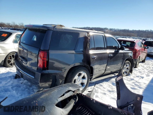 2015 Chevrolet Tahoe LTZ z VIN 1GNSKCKC8FR223832, wystawiony jako Copart lot #87023514 z przebiegiem Nie podano mil oraz Szkoda całkowita • Salvage title. Historia ofert i sprzedaży dostępna na DreamBid. Obrazek 3.