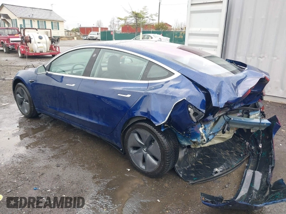 2018 Tesla Model 3 Long Range Battery with VIN 5YJ3E1EA9JF022782, listed as a IAAI auction lot 41875429 with 79,209 mi miles. Bid and sale history available at carsss.com. Image 3.