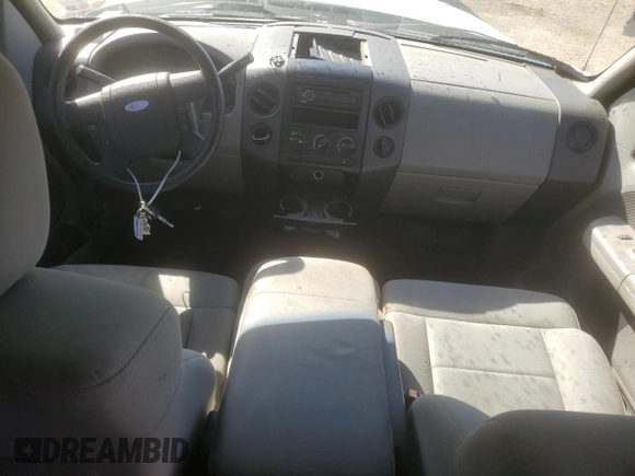 2007 Ford F-150 STX with VIN 1FTRX12W37NA05703, listed as a Copart auction lot 51927885 with 206,593 mi miles and Salvage Title. Bid and sale history available at DreamBid. Image 8.