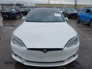 2021 Tesla Model S Long Range Plus with VIN 5YJSA1E21MF425482, listed as a IAAI auction lot 41886030 with Not provided miles and . Bid and sale history available at DreamBid. Image 11.