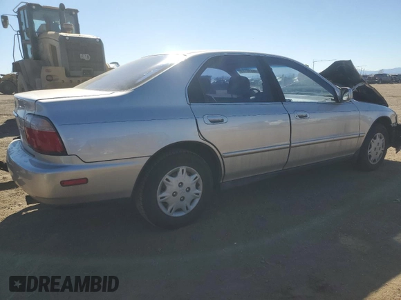 1996 Honda Accord Value with VIN 1HGCD5697TA226122, listed as a Copart auction lot 46810175 with 99,884 mi miles and Salvage Title. Bid and sale history available at DreamBid. Image 3.