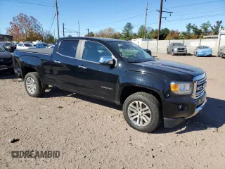2016 GMC Canyon 4WD SLT with VIN 1GTP6DE11G1357147, listed as a Copart auction lot 77835344 with 106,890 mi miles and Salvage Title. Bid and sale history available at carsss.com. Image 4.