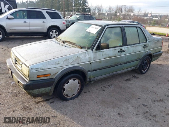 1991 Volkswagen Jetta z VIN 3VWRB21G1MM017401, wystawiony jako IAAI lot #41018295 z przebiegiem 206 316 mil mil oraz . Historia ofert i sprzedaży dostępna na DreamBid. Obrazek 2.