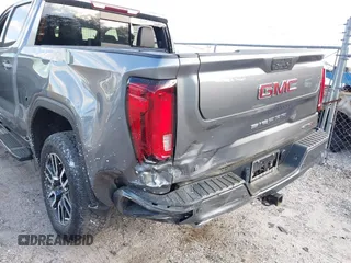 2021 GMC Sierra 1500 AT4 with VIN 1GTU9EET8MZ271591, listed as a IAAI auction lot 41566653 with 49,923 mi miles. Bid and sale history available at carsss.com. Image 6.