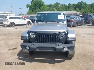 2019 Jeep Wrangler Unlimited Sahara with VIN 1C4HJXEN5KW542403, listed as a IAAI auction lot 42524989 with 60,451 mi miles and . Bid and sale history available at DreamBid. Image 6.
