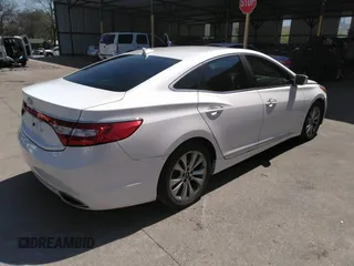2014 Hyundai Azera with VIN KMHFG4JG8EA346609, listed as a IAAI auction lot 42010249 with 105,646 mi miles and . Bid and sale history available at DreamBid. Image 4.