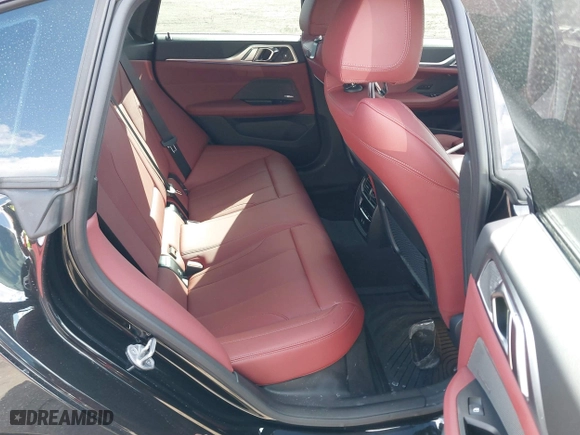 2024 BMW i4 xDrive40 with VIN WBY83FB04RFT19615, listed as a IAAI auction lot 41679918 with 3,883 mi miles. Bid and sale history available at carsss.com. Image 8.