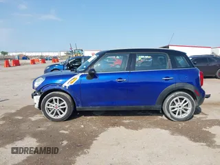 2015 MINI Countryman with VIN WMWZB3C56FWR43443, listed as a IAAI auction lot 41920848 with 91,192 mi miles and . Bid and sale history available at DreamBid. Image 15.