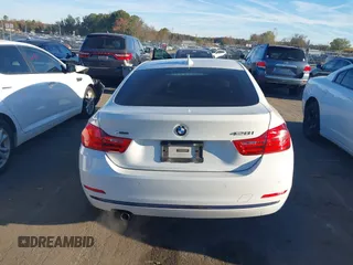 2016 BMW 4 Series 428i xDrive with VIN WBA4C9C54GG139275, listed as a IAAI auction lot 40828786 with 128,124 mi miles and . Bid and sale history available at carsss.com. Image 16.