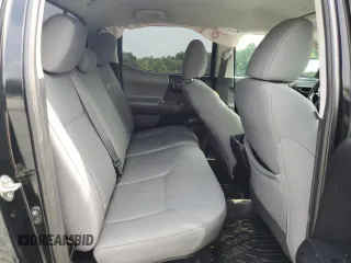 2020 Toyota Tacoma SR5 with VIN 3TMCZ5AN0LM299243, listed as a Copart auction lot 58818825 with 76,449 mi miles and Salvage title. Bid and sale history available at DreamBid. Image 10.