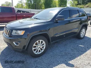 2016 Jeep Grand Cherokee Laredo z VIN 1C4RJEAG0GC451743, wystawiony jako Copart lot #52260655 z przebiegiem 159 924 mil mil oraz Czysty tytuł • Clean title. Historia ofert i sprzedaży dostępna na DreamBid. Obrazek 1.