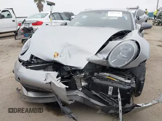 2023 Porsche 911 Carrera with VIN WP0AA2A93PS206048, listed as a IAAI auction lot 42022225 with 6,439 mi miles and . Bid and sale history available at DreamBid. Image 6.