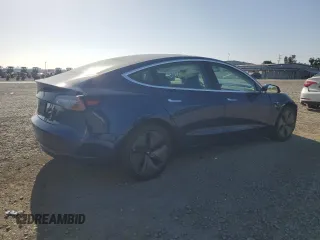 2019 Tesla Model 3 Mid Range z VIN 5YJ3E1EAXKF299345, wystawiony jako Copart lot #58335555 z przebiegiem 69 372 mil mil oraz Szkody całkowita. Historia ofert i sprzedaży dostępna na DreamBid. Obrazek 3.