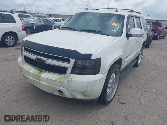 2009 Chevrolet Tahoe 2LT z VIN 1GNFC23059R156494, wystawiony jako IAAI lot #42423722 z przebiegiem Nie podano mil oraz . Historia ofert i sprzedaży dostępna na DreamBid. Obrazek 2.