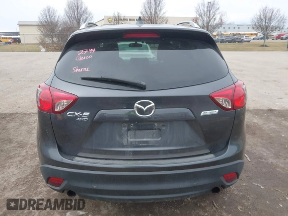 2014 Mazda CX-5 Grand Touring with VIN JM3KE4DY4E0343863, listed as a IAAI auction lot 41770402 with 117,615 mi miles. Bid and sale history available at carsss.com. Image 16.