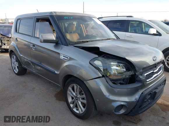 2011 Kia Soul + with VIN KNDJT2A27B7215666, listed as a IAAI auction lot 41600060 with 185,480 mi miles. Bid and sale history available at carsss.com. Image 1.