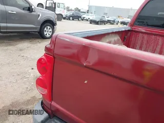 2006 Dodge Dakota SLT with VIN 1D7HE48KX6S598831, listed as a IAAI auction lot 41292884 with 173,181 mi miles and . Bid and sale history available at carsss.com. Image 20.
