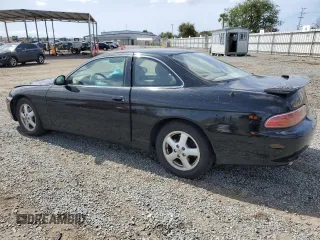 1997 Lexus SC 400 z VIN JT8CH32Y6V1000062, wystawiony jako Copart lot #51287595 z przebiegiem 243 624 mil mil oraz Szkody całkowita. Historia ofert i sprzedaży dostępna na DreamBid. Obrazek 2.