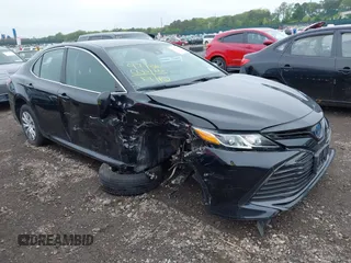 2019 Toyota Camry Hybrid LE z VIN 4T1B31HK5KU510055, wystawiony jako IAAI lot #42325522 z przebiegiem 97 000 mil mil oraz . Historia ofert i sprzedaży dostępna na DreamBid. Obrazek 1.